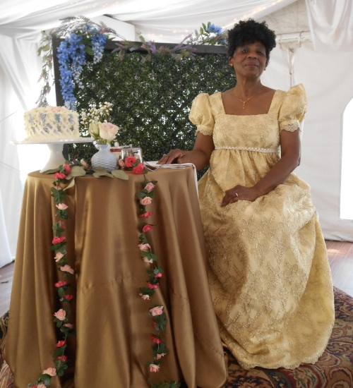 Ms. Black at the Queen's table